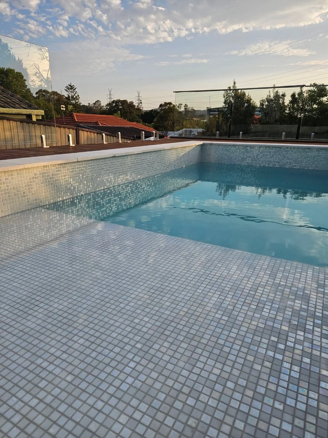 Pool tiled in pearl glass mosaic
